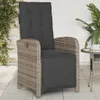 A single outdoor chair with cushions on a patio. Produktbild-Vorschau