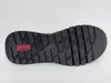 The sole of a black shoe is shown against a white background. Produktbild-Vorschau