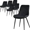 A set of six black dining chairs with quilted velvet seats and black metal legs, arranged on a white background.