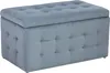 A tufted storage ottoman in a light blue-grey velvet fabric, shown from a slight angle against a white background. Náhled obrázku produktu