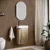 A modern bathroom setting with a wall-mounted vanity, sink, faucet, mirror, and towel. Voir les images du produit