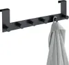 A black over-the-door hook rack with a towel hanging from one of the hooks, against a white background. Podgląd zdjęcia produktu