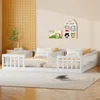 A children's bedroom with two white wooden beds, decorated with cartoon wall art. Náhľad obrázku produktu