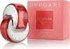 A perfume bottle and its box are displayed side-by-side on a white background. Voir les images du produit