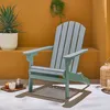 An outdoor setting with a chair, plants, and drinks. Anteprima dell’immagine prodotto