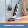 A person is using a cordless wet and dry vacuum cleaner to clean up a spill on a wooden floor next to a wall. Produktbild-Vorschau