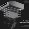 An exploded view of a range hood showing its multi-layered filter system, with smoke effects below. Produktbild-Vorschau