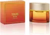 A product shot of a perfume bottle and its box, both featuring an orange gradient and gold accents. Anteprima dell’immagine prodotto