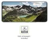 A smartphone screen displaying a mountain landscape, with a graphic icon below indicating a matte, anti-reflective screen. Produktbild-Vorschau