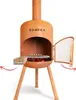A corten steel outdoor fireplace with a grill grate and an open door, showing burning coals inside. Produktbild-Vorschau