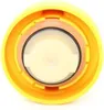 Top-down view of a yellow cap with internal components. Náhled obrázku produktu