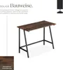 A close-up studio shot of a brown and black desk. Produktbild-Vorschau