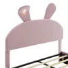A close-up view of the headboard of a pink bed with bunny ears. Podgląd zdjęcia produktu