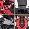 A collage of four close-up images of a red and white electric toy motorcycle, specifically a Honda CBR 1000RR model. Voir les images du produit