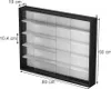 A 3D rendering of a black wall display cabinet with white shelves and a white back panel, showing dimensions. Podgląd zdjęcia produktu