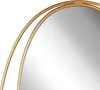 A close-up shot of a gold-colored mirror frame. Náhled obrázku produktu