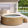 An inflatable hot tub is set up on a patio next to a swimming pool, with a modern kitchen visible in the background. Náhľad obrázku produktu