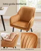 A collage of images showing a caramel brown velvet armchair with black metal legs, a close-up of the armchair's textured fabric, and a person sitting in the armchair reading a book. Produktbild-Vorschau