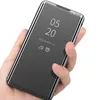 A hand holding a smartphone with a reflective flip case. Produktbild-Vorschau