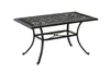 A black metal rectangular outdoor dining table with an ornate, patterned tabletop and curved legs, shown against a white background. Náhled obrázku produktu