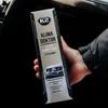 A hand holding a box of K2 Klima Doctor A/C cleaner inside a car. Anteprima dell’immagine prodotto