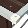 Close-up of the corner of a brown metal structure with a gray metal frame and a white plastic corner protector. Anteprima dell’immagine prodotto