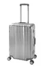 A silver, ribbed suitcase with a retractable handle and four wheels is shown against a white background. Náhľad obrázku produktu