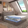 A cutaway view of a mattress on a bed in a room with a skylight. Produktbild-Vorschau