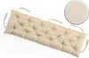 A tufted bench cushion in a neutral beige color is shown against a white background. A circular inset in the upper right corner provides a close-up view of the fabric texture. Produktbild-Vorschau
