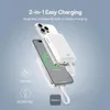 A white power bank is shown magnetically attached to a smartphone, with another smartphone underneath. The image highlights the charging capabilities of the power bank. Produktbild-Vorschau