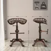 Two bar stools with tractor seat style seats are shown with dimensions and weight capacity information. Náhľad obrázku produktu