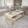 A coffee table with books and a plant in a living room setting. Produktbild-Vorschau