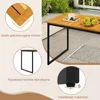A close-up view of a wooden outdoor table with black metal legs, showcasing its features. Produktbild-Vorschau
