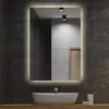 A modern bathroom vanity with a sink and a lighted mirror. Produktbild-Vorschau