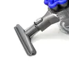 A close-up view of a vacuum cleaner attachment and part of the vacuum cleaner body. Produktbild-Vorschau