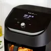 Close-up of the top and front of a black Instant Pot Vortex Plus Airfryer, showing the digital display and controls. Produktbild-Vorschau