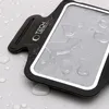 Close-up of a black armband phone holder with water droplets on it. Náhled obrázku produktu