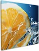Wallario Premium Leinwandbild Orange in spritzigem Wasser Produktbild-Vorschau 1