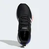 Top-down view of a black Adidas sneaker with white accents and red and blue detailing. Podgląd zdjęcia produktu
