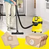 A person is vacuuming a floor with a yellow vacuum cleaner, and vacuum cleaner bags are displayed in the foreground. Produktbild-Vorschau