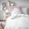 A child's bedroom with a bed made up with "Sweet Dreams" themed bedding. Produktbild-Vorschau