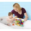 A mother and child are playing with a bath toy in a bathtub. Podgląd zdjęcia produktu