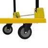 A close-up view of the wheels and part of the frame of a yellow platform trolley. Náhled obrázku produktu