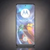 A Motorola Moto E32 smartphone is displayed against a gradient gray background, showcasing its screen with the Motorola logo and product name. Produktbild-Vorschau