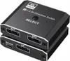 A close-up, slightly angled view of a black DisplayPort bi-directional switch with ports labeled DP1, DP2, and DC/5V. Produktbild-Vorschau