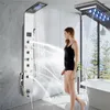 A woman is standing in a modern bathroom, using a multi-function shower panel with LED lights and multiple water outlets. Náhľad obrázku produktu