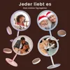 Collage of four circular images showing different scenes, each framed by a cosmetic mirror. The scenes include a young girl, an elderly couple in Santa hats, a couple receiving a gift, and two pets. The mirrors are mounted on stands of different colors. Podgląd zdjęcia produktu
