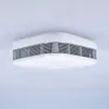 A white smoke detector is mounted on a white ceiling. Podgląd zdjęcia produktu