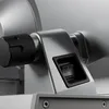 Close-up of a switch and a dial on a silver appliance. Anteprima dell’immagine prodotto