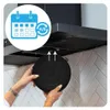 A person is shown installing a charcoal filter into a range hood. Produktbild-Vorschau